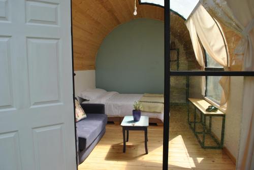 Ein Bett oder Betten in einem Zimmer der Unterkunft La Carolita
