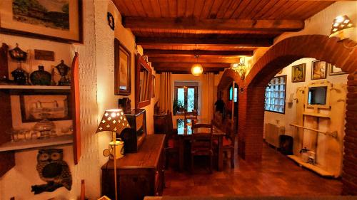 a living room with an archway in a house at La Covatilla III in La Hoya