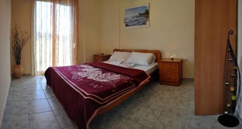 Postel nebo postele na pokoji v ubytování Agapi Apartments