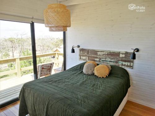 Ένα ή περισσότερα κρεβάτια σε δωμάτιο στο Plancton