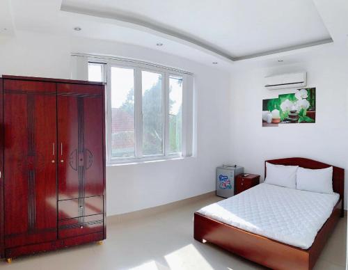 Giường trong phòng chung tại Rio 009 homestay