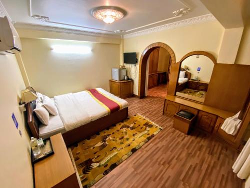 Postel nebo postele na pokoji v ubytování Hotel Bodhiz