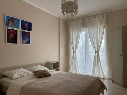 Un pat sau paturi într-o cameră la Beautiful Colors Residence Villa