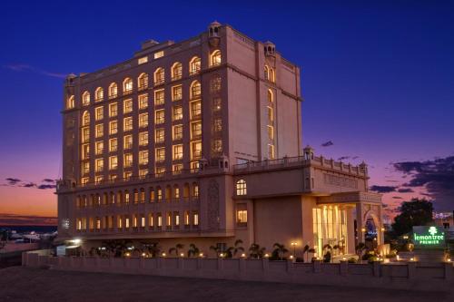 a large building with many windows at night at Lemon Tree Premier, Dwarka in Dwarka