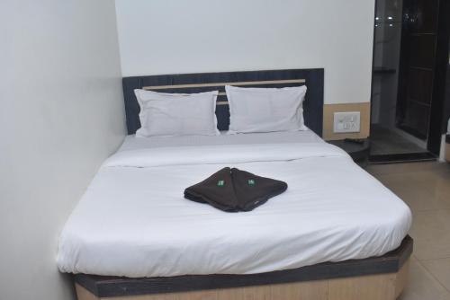 Cama o camas de una habitación en Blueberry Budget Hotel