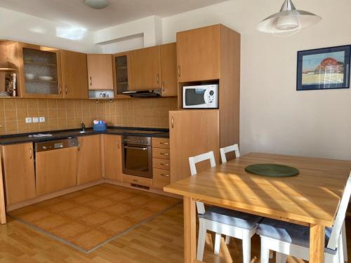 Kuchyň nebo kuchyňský kout v ubytování Apartment Riviera 507-1 Lipno Home