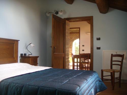 Una cama o camas en una habitación de Agriturismo Terrazza sul Parco