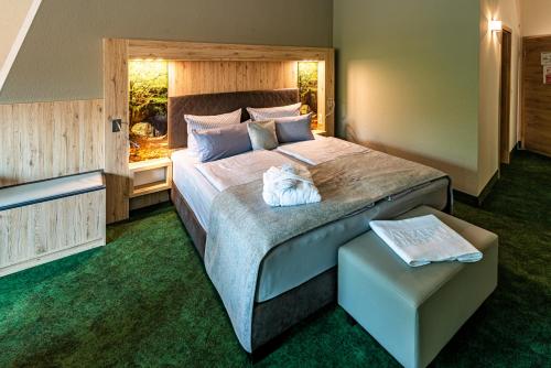 Llit o llits en una habitació de AKZENT Hotel Zur Post