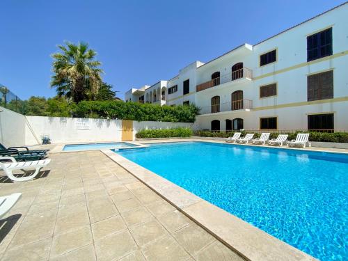 Charmoso apartamento em zona calma com piscina #1879