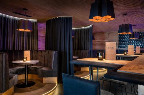 Гостиная зона в Hüttenhof - Wellnesshotel & Luxus-Bergchalets - Adults only