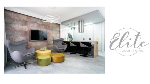 Televízia a/alebo spoločenská miestnosť v ubytovaní Elite Apartments Waterlane Free Swimming Pool Access