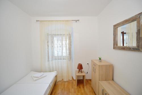 Katil atau katil-katil dalam bilik di Stone house Dobrota