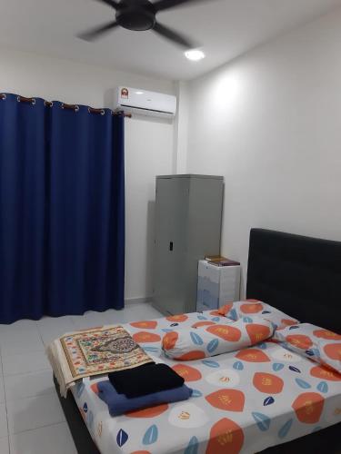 Postel nebo postele na pokoji v ubytování Rumah Armand Melaka 4BR Fully Aircond