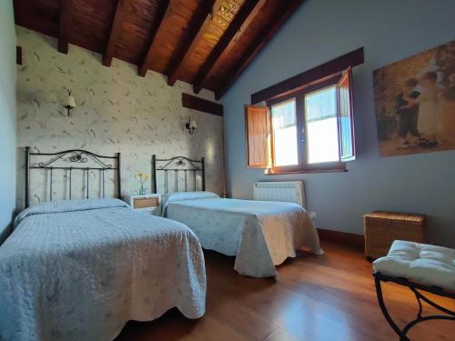 Ένα ή περισσότερα κρεβάτια σε δωμάτιο στο El MIRADOR DE TONO , Casa entera