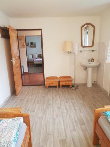 a bathroom with a sink and a mirror at Dům V Podzámčí in Mělník