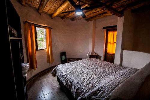 A bed or beds in a room at Cabañas La Ekeka
