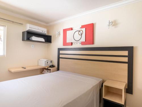 Postel nebo postele na pokoji v ubytování Diroma Resort Internacional Temporada