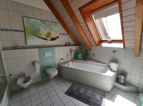 Ett badrum på Ferienhaus Feder