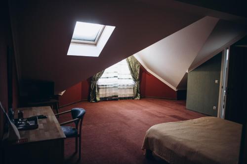 Posteľ alebo postele v izbe v ubytovaní Дбайлива Ципа