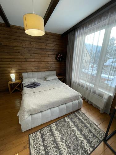 Postel nebo postele na pokoji v ubytování Girske Povitria 2