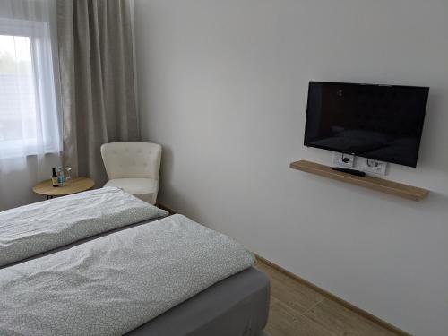 TV a/nebo společenská místnost v ubytování Evita Apartmani Šibovska
