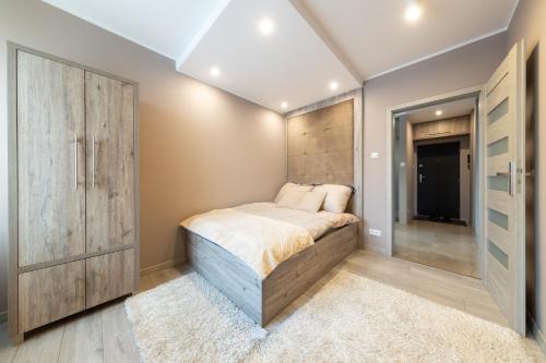 Postel nebo postele na pokoji v ubytování APARTVIP Akademicka