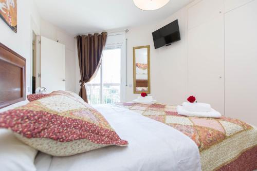 Cama o camas de una habitación en Stay Barcelona Central Apartments