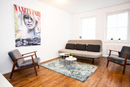 Photo de la galerie de l'établissement Moderne 2-Zimmer Wohnung! WLAN und Netflix inklusive! Zentral gelegen in der historischen Altstadt!, à Stade