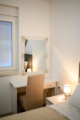 Ένα ή περισσότερα κρεβάτια σε δωμάτιο στο APARTMAN ANA, METKOVIĆ