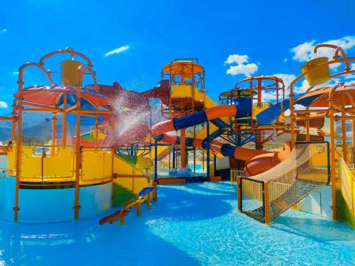 a water park with a colorful water slide at Eastern El-Galala Aquapark Ain Sokhna in Ain Sokhna
