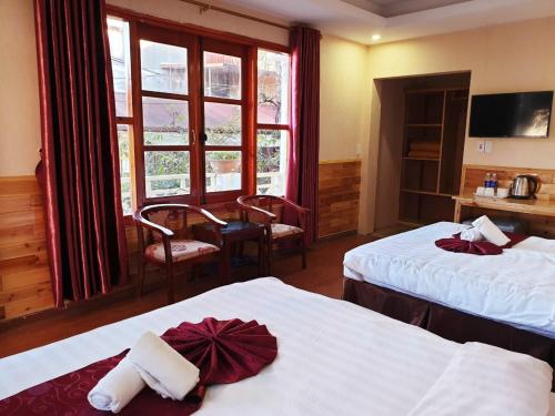 Postel nebo postele na pokoji v ubytování Dang Khoa Garden Inn Homestay