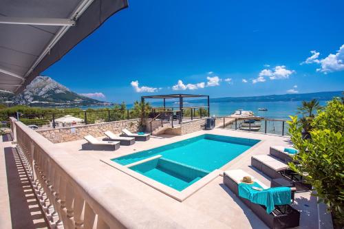 Beachfront Villa Draga with 32sqm private, heated pool, 4 bedrooms, sea view