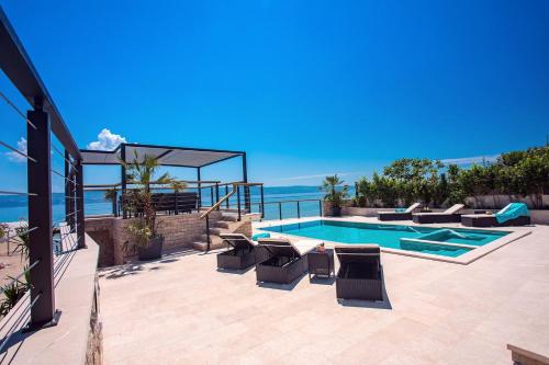 Beachfront Villa Draga with 32sqm private, heated pool, 4 bedrooms, sea view