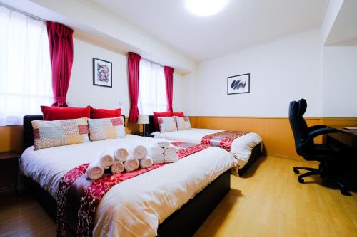 Posteľ alebo postele v izbe v ubytovaní ケイアイコンホテルズ 新栄301