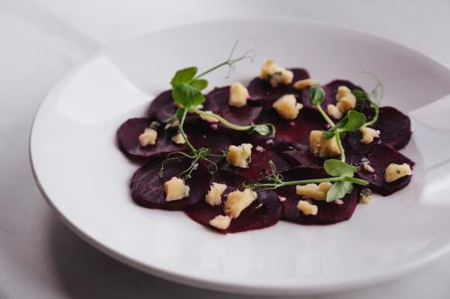 a plate of food on a white plate at Oatlands Park Hotel in Weybridge