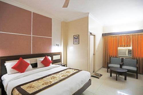 Hotel Tashkent Palace - Near New Delhi Railway Stationにあるベッド
