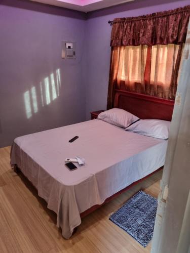 מיטה או מיטות בחדר ב-Trésor Caché TT