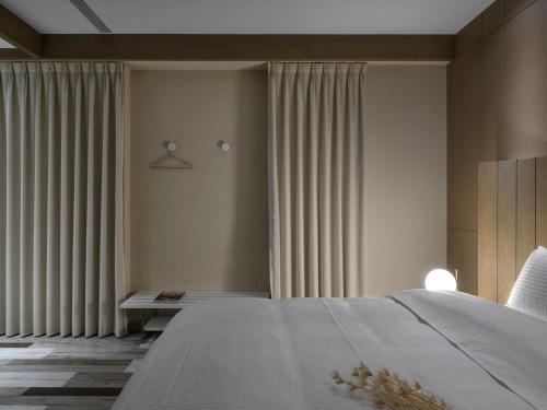 Katil atau katil-katil dalam bilik di Boju Homestay