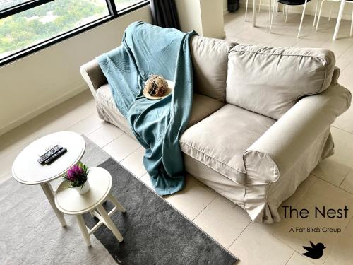 Un lugar para sentarse en Cozy Tamarind Suites