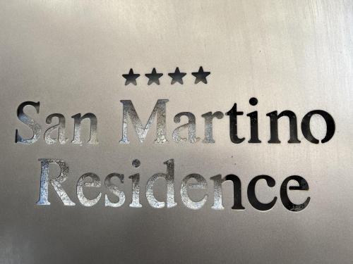 a sign with four stars on a wall with the words san marino reference at Residence San Martino in Messina