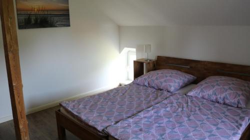 Katil atau katil-katil dalam bilik di Ferien in Zernin