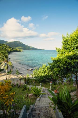 a view of the beach from a resort at Legon Waru Cottage in Karimunjawa