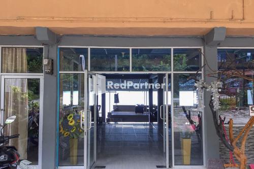 Фотография из галереи Aquino Marito Homestay Mitra RedDoorz в Балиге