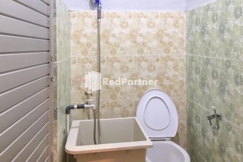 Gallery image of Aquino Marito Homestay Mitra RedDoorz in Balige