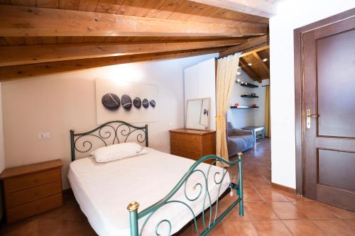 Ein Bett oder Betten in einem Zimmer der Unterkunft Appartamenti Caterina