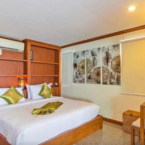 Ένα ή περισσότερα κρεβάτια σε δωμάτιο στο Goodwill Beach House