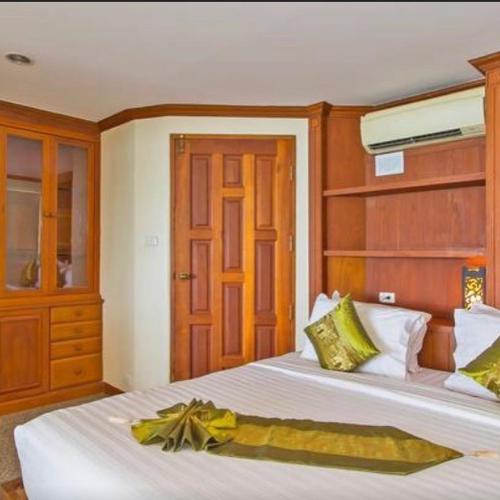Ένα ή περισσότερα κρεβάτια σε δωμάτιο στο Goodwill Beach House