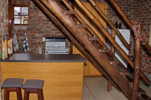 Kuchyň nebo kuchyňský kout v ubytování Harmony and Melody self catering