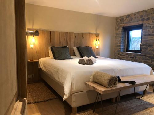 Postel nebo postele na pokoji v ubytování La petite Reuleau - Gites champêtre "LE FENIL" et "LA FERMETTE SAUNA "