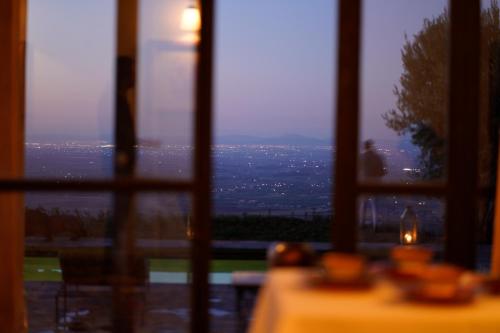 a view of the city from a window at ourika oufla in Ourika